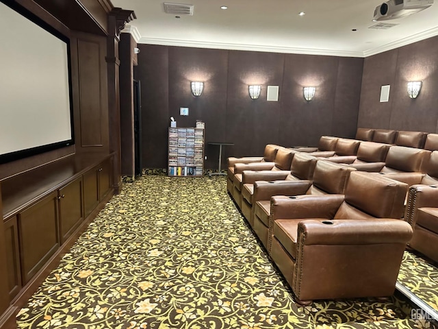 home theater with visible vents and ornamental molding