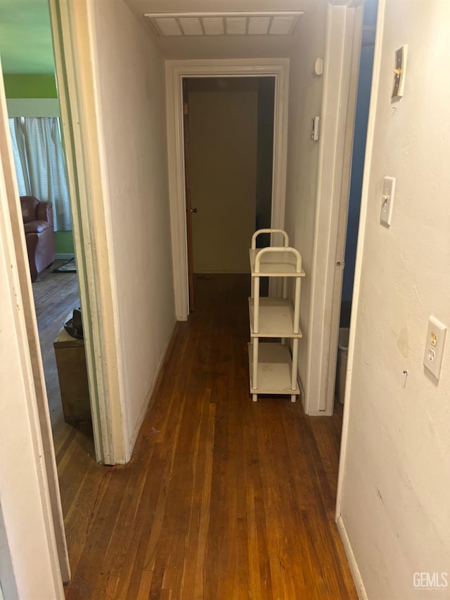 1105 Vanderbilt Dr, Bakersfield, CA 93305 - hallway featuring dark wood-style floors