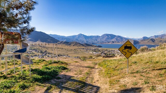 property view of mountains featuring a water view