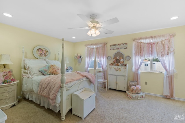 carpeted bedroom with ceiling fan