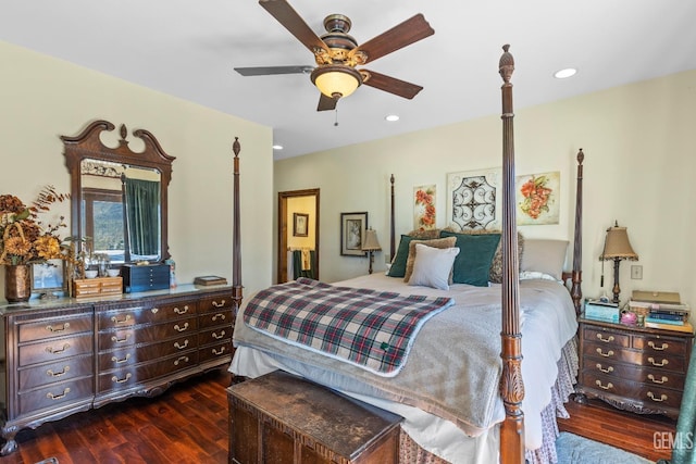 bedroom with ceiling fan and dark wood-type flooring