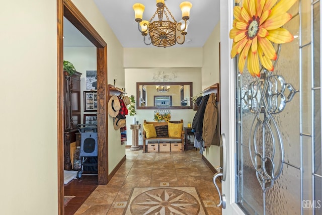 foyer featuring an inviting chandelier