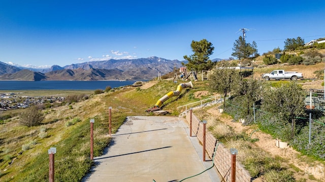 view of mountain feature with a water view