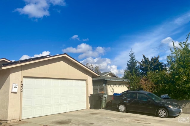 view of home's exterior with a garage