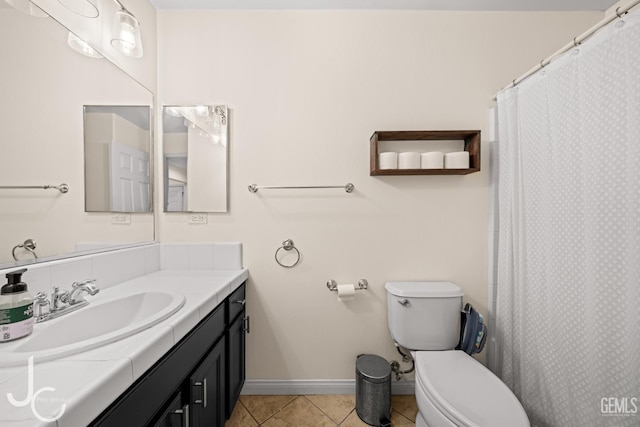 13421 Cheyenne Mountain Dr, Bakersfield, CA 93314 - full bathroom with vanity, tile patterned floors, toilet, baseboards, and a shower with curtain