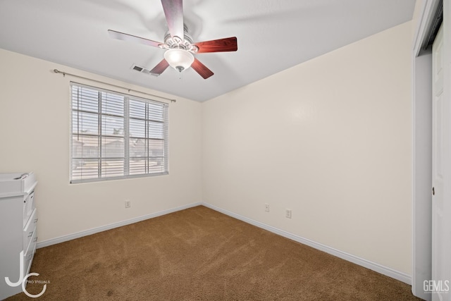 13421 Cheyenne Mountain Dr, Bakersfield, CA 93314 - empty room featuring carpet floors, ceiling fan, and baseboards