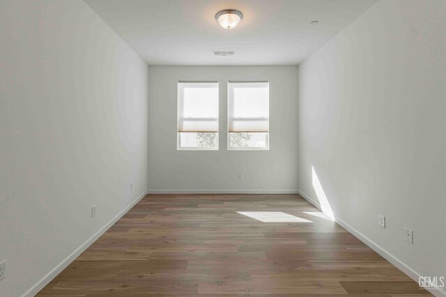 14209 Boon Way, Bakersfield, CA 93311 - unfurnished room with hardwood / wood-style flooring