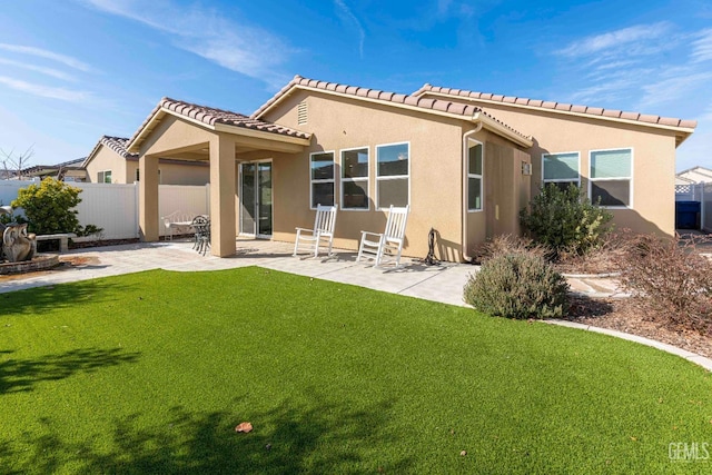 14209 Boon Way, Bakersfield, CA 93311 - rear view of property with a lawn and a patio area
