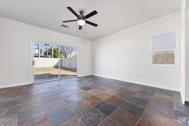 unfurnished room with ceiling fan