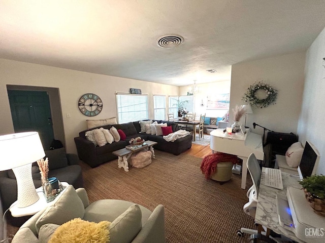 living room featuring a chandelier