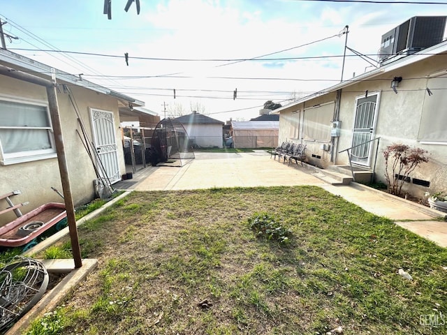 view of yard with a patio area