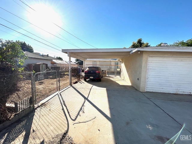 exterior space with a carport