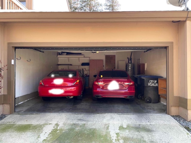 4747 W Iris Ave, Visalia, CA 93277 - garage featuring secured water heater