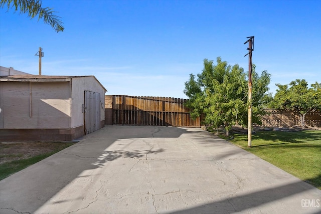 exterior space with a storage shed