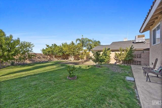 view of yard featuring central AC