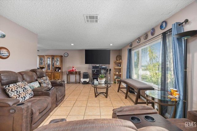 tiled living room with a textured ceiling