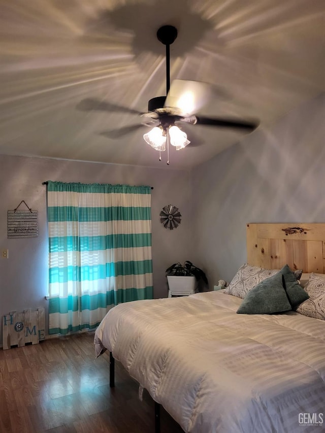 9101 Kern Island St, Bakersfield, CA 93307 - bedroom featuring wood finished floors and ceiling fan