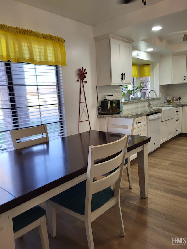 9101 Kern Island St, Bakersfield, CA 93307 - dining space with dark wood-style floors and recessed lighting