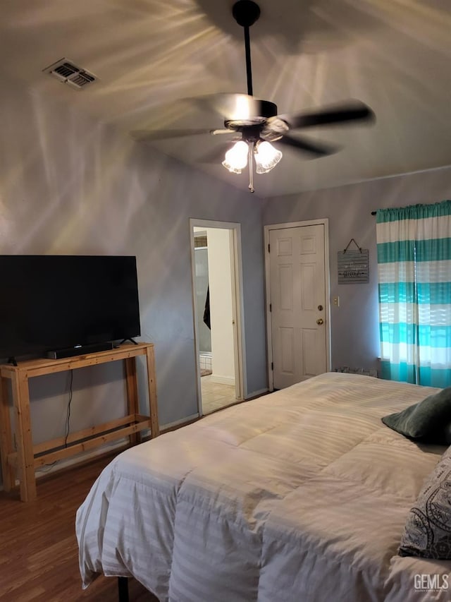 9101 Kern Island St, Bakersfield, CA 93307 - bedroom featuring ceiling fan and wood finished floors