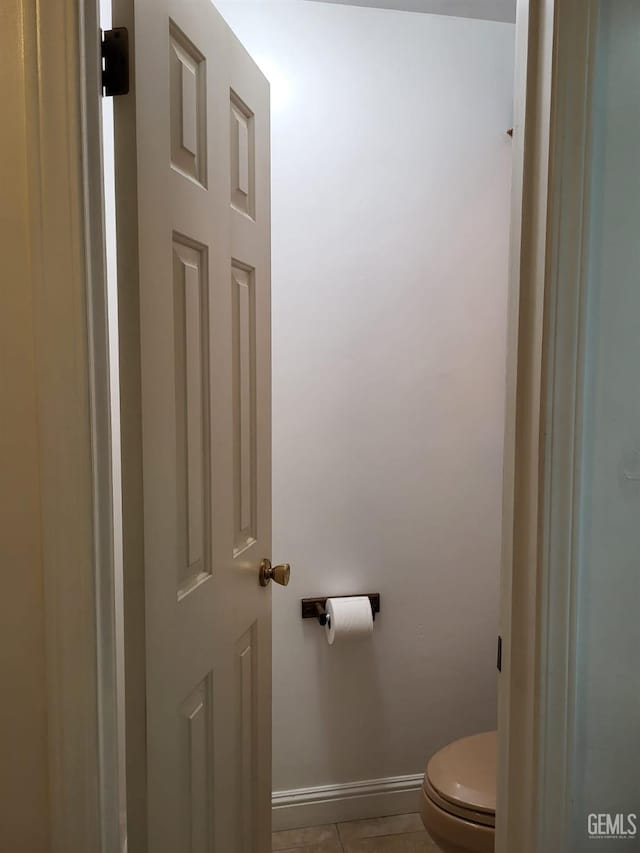 9101 Kern Island St, Bakersfield, CA 93307 - bathroom with toilet and tile patterned flooring