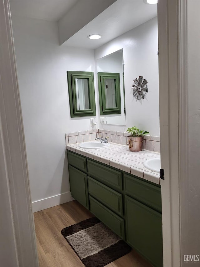 9101 Kern Island St, Bakersfield, CA 93307 - full bath with double vanity and wood finished floors