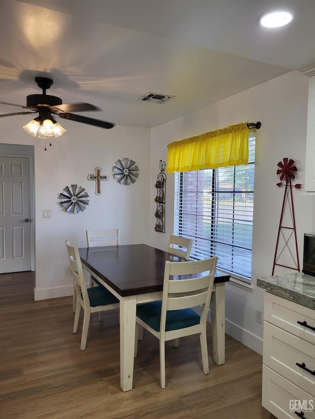 9101 Kern Island St, Bakersfield, CA 93307 - dining room featuring dark wood finished floors and a ceiling fan