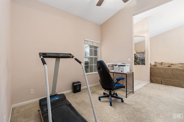 home office featuring light colored carpet, ceiling fan, and lofted ceiling