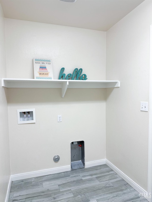 9400 Carriage Creek Ct, Bakersfield, CA 93311 - laundry room featuring wood finished floors, hookup for a washing machine, and baseboards