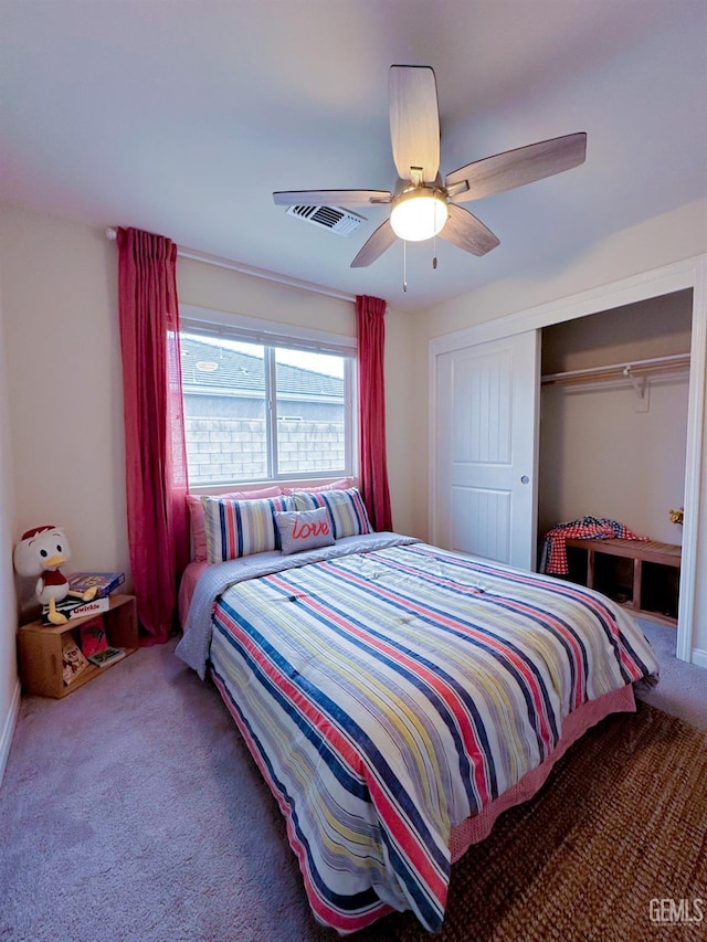 9400 Carriage Creek Ct, Bakersfield, CA 93311 - bedroom with carpet, a closet, and a ceiling fan