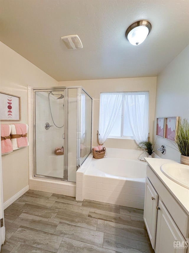 9400 Carriage Creek Ct, Bakersfield, CA 93311 - bathroom with a shower stall, a garden tub, and vanity