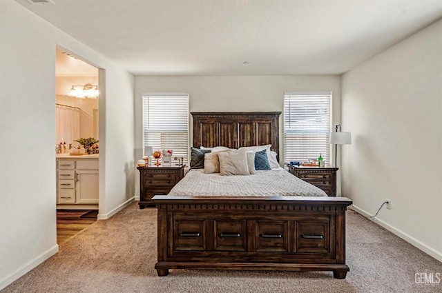 6003 Vespucci Ave, Bakersfield, CA 93313 - bedroom with light carpet and ensuite bath