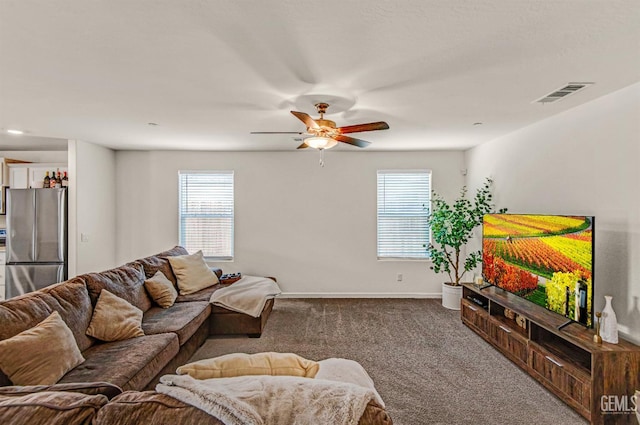 6003 Vespucci Ave, Bakersfield, CA 93313 - living room with plenty of natural light, carpet, and ceiling fan