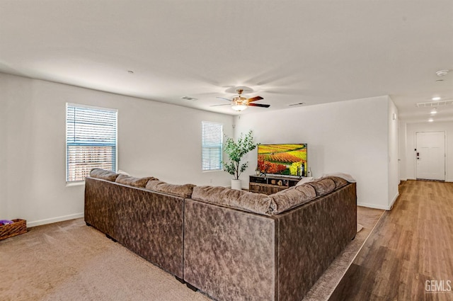 6003 Vespucci Ave, Bakersfield, CA 93313 - carpeted living area with ceiling fan and recessed lighting