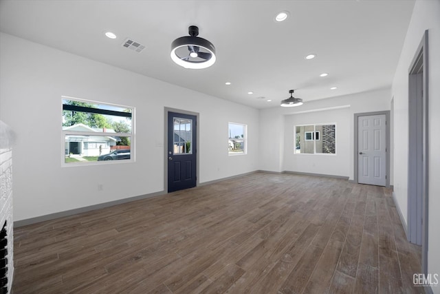 329 F St, Bakersfield, CA 93304 - unfurnished living room featuring wood finished floors, recessed lighting, baseboards, and a ceiling fan