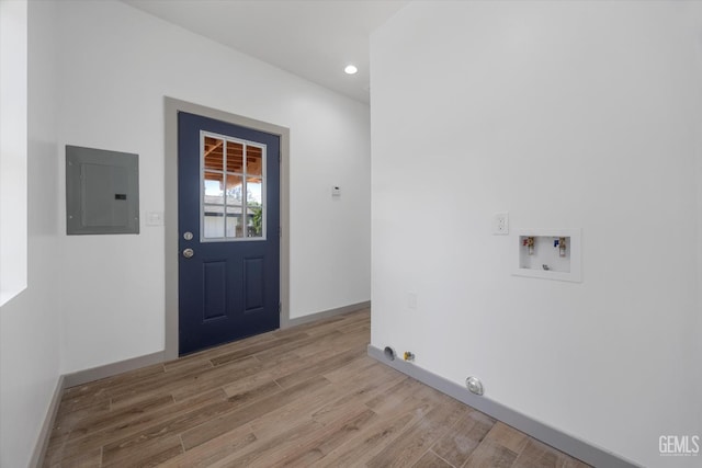 329 F St, Bakersfield, CA 93304 - clothes washing area featuring electric panel, washer hookup, light wood-style floors, recessed lighting, and baseboards