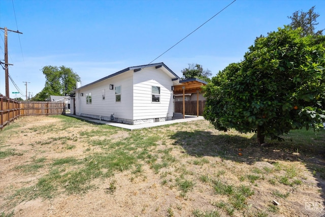 329 F St, Bakersfield, CA 93304 - back of house with a fenced backyard