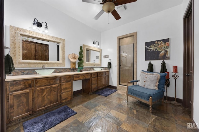 9200 Bridget Leigh Way, Bakersfield, CA 93312 - full bathroom featuring stone tile floors, double vanity, a stall shower, and a ceiling fan