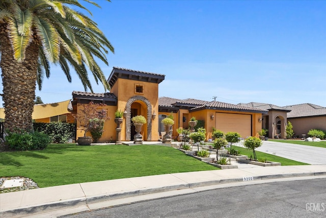 9200 Bridget Leigh Way, Bakersfield, CA 93312 - mediterranean / spanish-style house featuring stucco siding, concrete driveway, an attached garage, and a tile roof