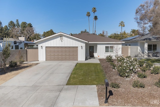 ranch-style home featuring a garage