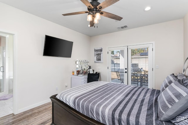 bedroom with ceiling fan, ensuite bath, light hardwood / wood-style flooring, and access to outside