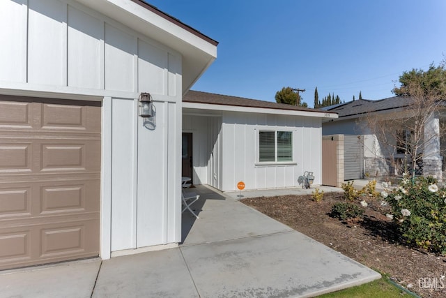 property entrance with a garage