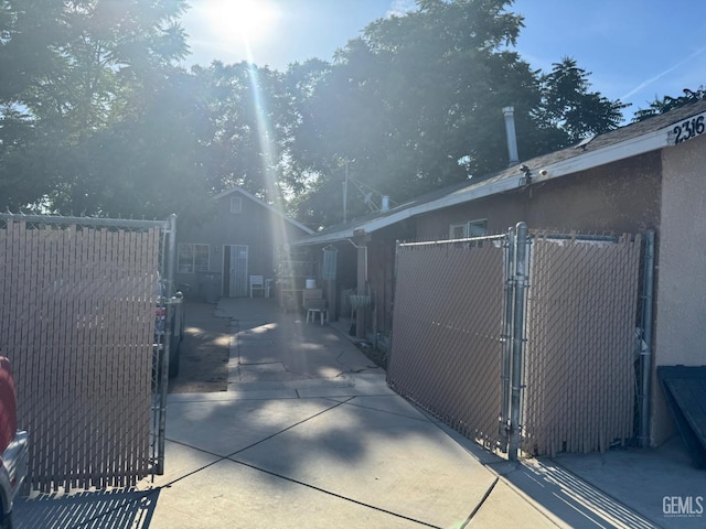 view of gate featuring fence