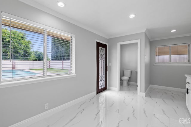bathroom featuring baseboards, toilet, recessed lighting, ornamental molding, and vanity