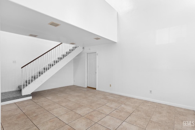 interior space with tile patterned floors