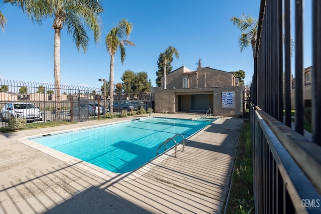 view of swimming pool featuring a patio