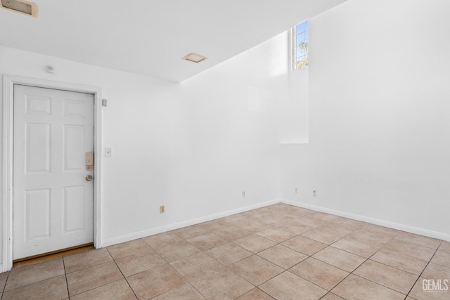 view of tiled spare room