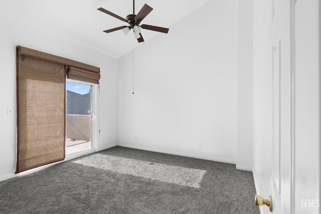 carpeted spare room featuring ceiling fan and lofted ceiling