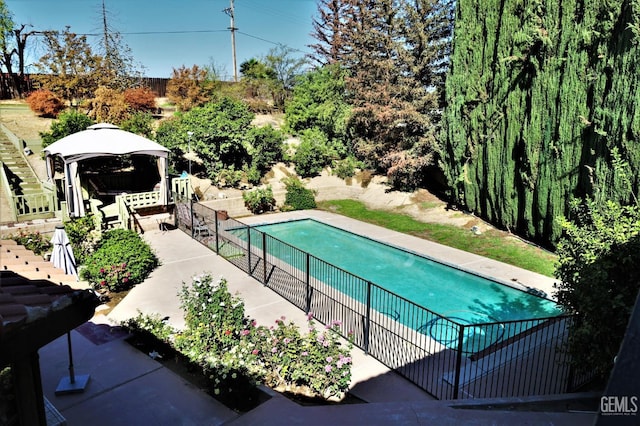 view of pool featuring a patio area and a gazebo