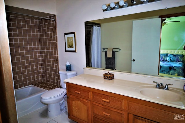 full bathroom with toilet, tile patterned flooring, shower / bathtub combination with curtain, and vanity