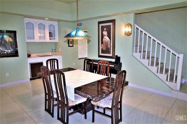 tiled dining area with bar area